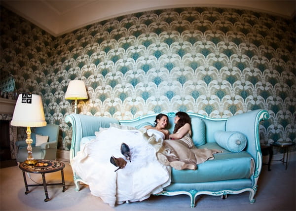 Picture of a bride laying on a sofa by Anneli Marinovich Photography