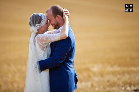 Picture of a bride and groom sharing a tender moment by Anneli Marinovich Photography