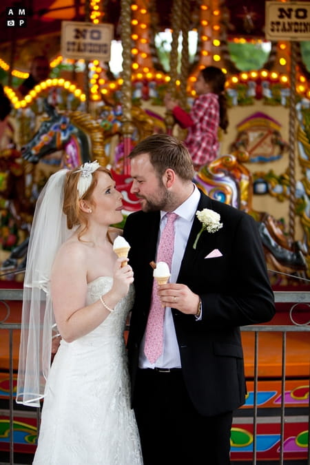 Picture of a bride and groom eating ice cream at a fairground by Anneli Marinovich Photography 