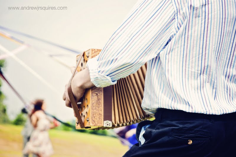 Accordion player at a wedding by Andrew J R Squires Photography