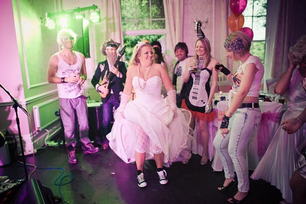 Bride dancing at her wedding - Martins Kikulis Photography