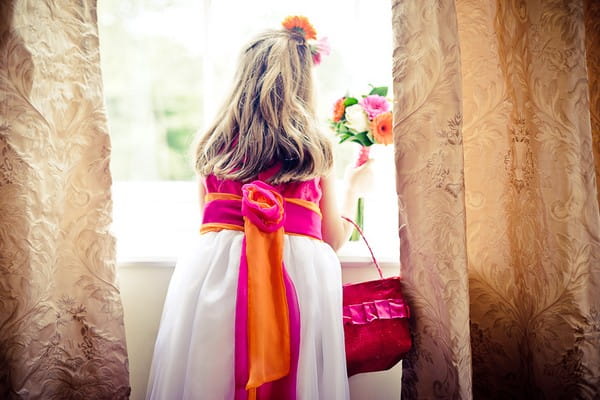 Flower girl looking out of a window - Martins Kikulis Photography