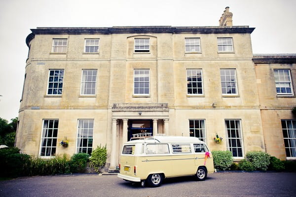 VW camper van outside of a wedding venue - Martins Kikulis Photography