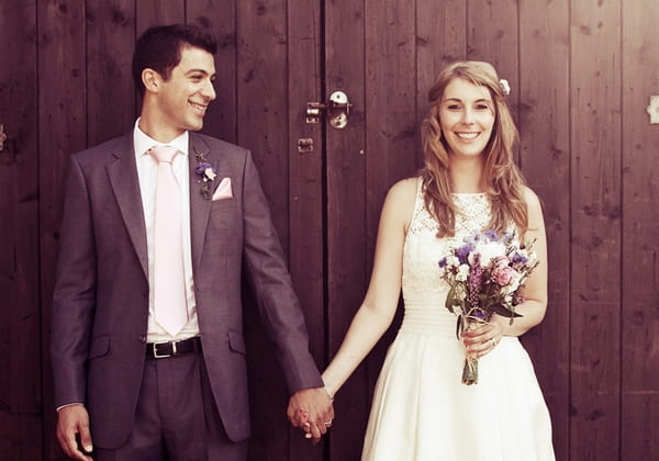 Bride and groom holding hands - Picture by Rebecca Wedding Photography