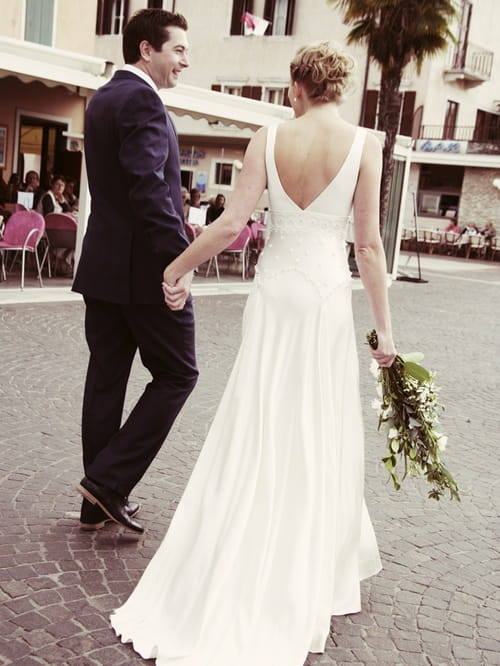 Bride and groom walking holding hands - Picture by Rebecca Wedding Photography