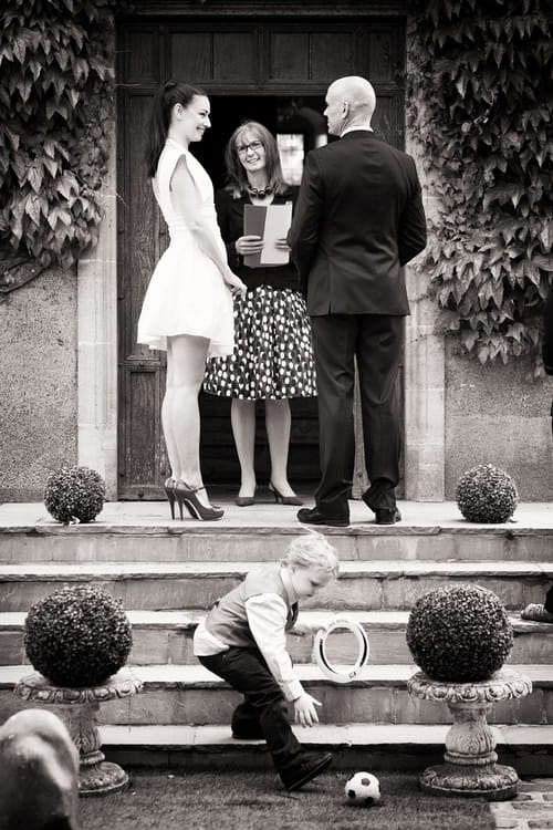 Bride and groom with registrar - Sam Gibson Wedding Photography