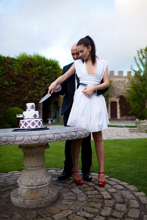 Bride and groom cutting wedding cake - Sam Gibson Wedding Photography