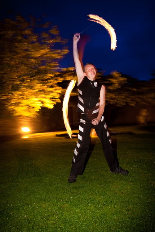 Fire dancer at Walton Castle in Clevedon - Sam Gibson Wedding Photography