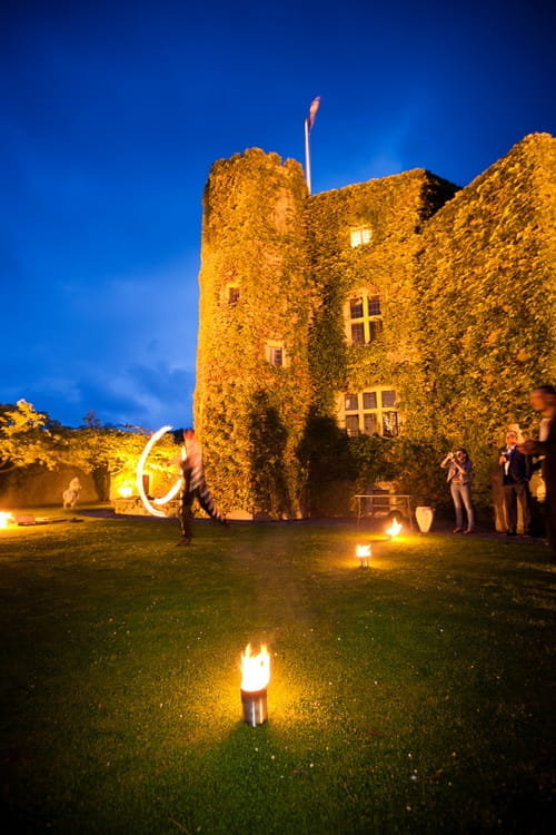 Fire dancing at Walton Castle in Clevedon - Sam Gibson Wedding Photography