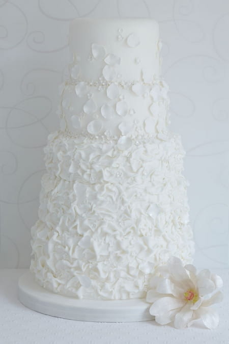 Rouched Dress Wedding Cake with Sugar Petals, Blossom, Sugar Diamante and Magnolia Sugar Flower - The Abigail Bloom Cake Company