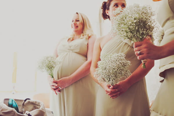 Bridesmaids holding bouquets