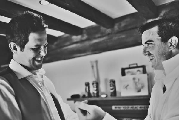 Groom and best man getting ready