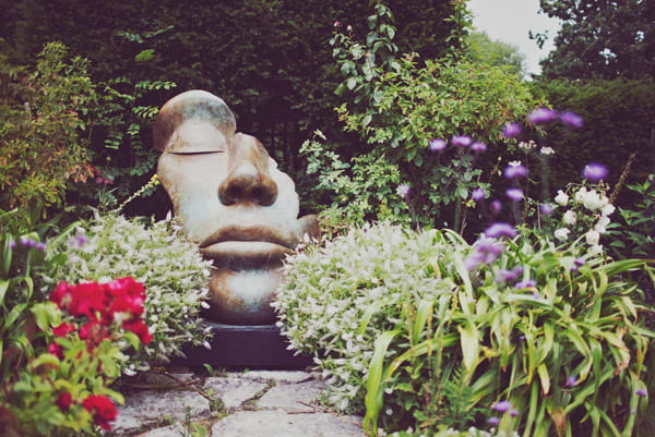 Face garden statue