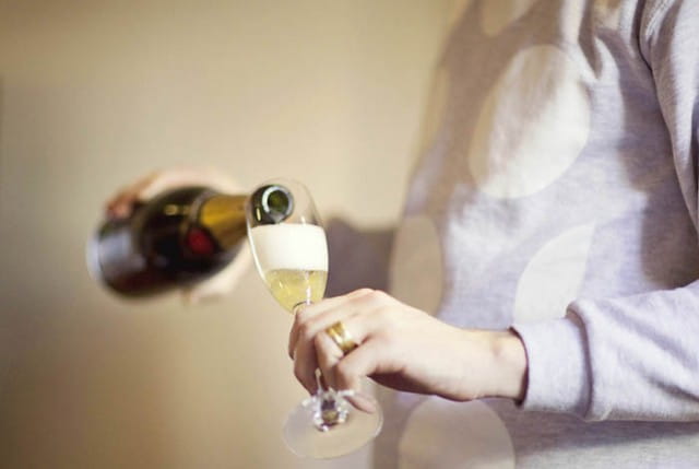 Pouring Champagne - Picture by Laura McCluskey Photography
