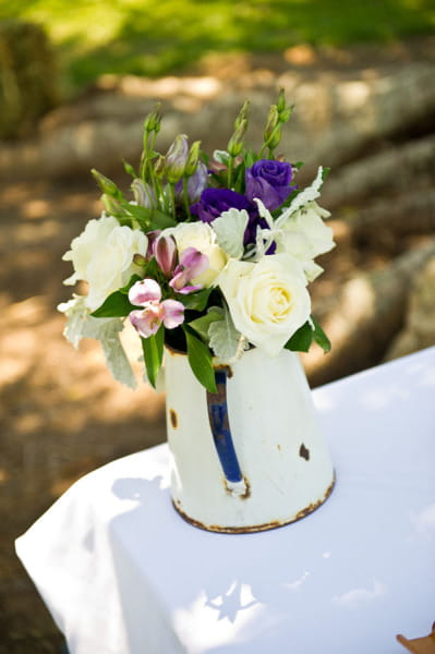 Wedding flowers in a vintage jug - Picture by Andrea Sproxton Photography