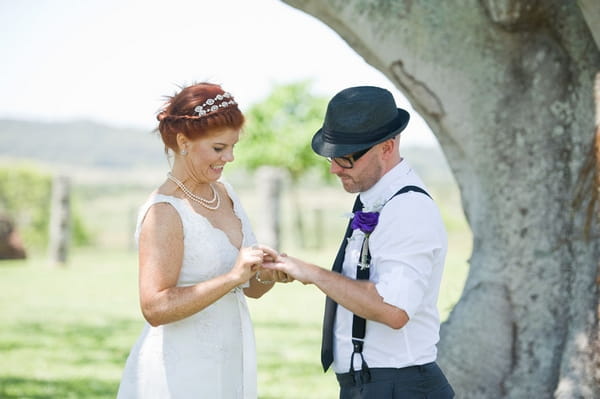 Bride and groom exchanging rings - Picture by Andrea Sproxton Photography