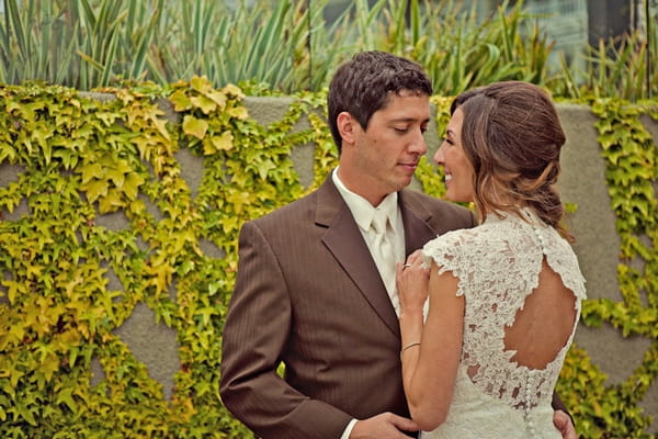 Bride and groom looking into each others eyes - Picture by Captured by Aimee