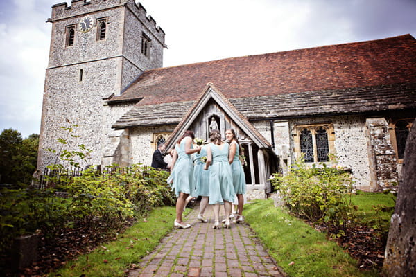 Bridesmaids outside church before wedding - Picture by Andrew J R Squires Photography