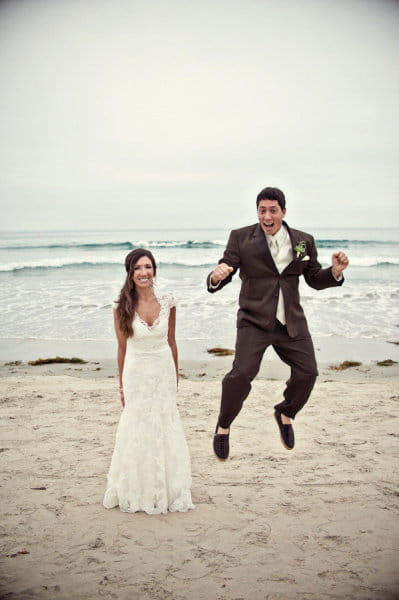 Groom jumping on beach - Picture by Captured by Aimee