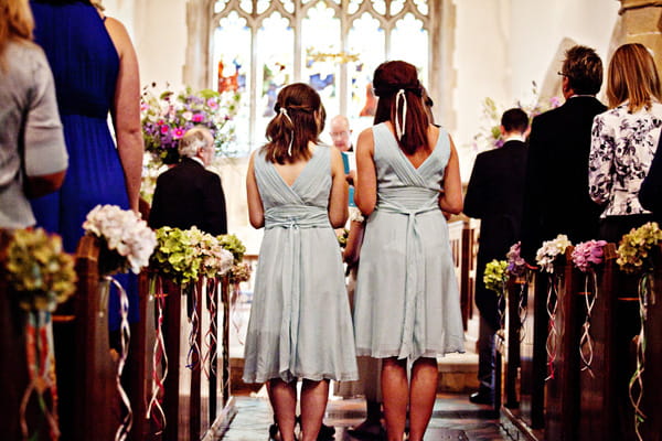 Back of bridesmaids in wedding ceremony - Picture by Andrew J R Squires Photography