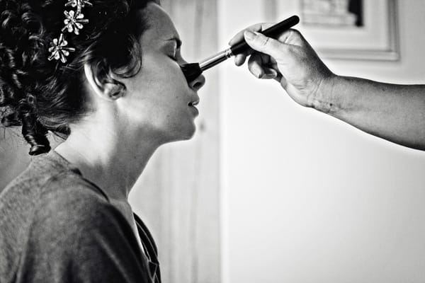 Bride having wedding make-up applied - Picture by Andrew J R Squires Photography