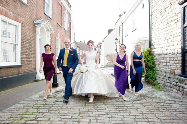 Bridal party walking along cobbled street - Picture by Lemontree Photography