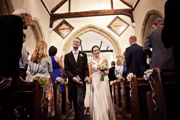 Newly married bride and groom leaving wedding ceremony - Picture by Andrew J R Squires Photography