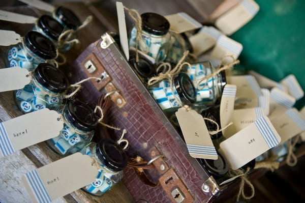 Sweet wedding favours in vintage suitcase - Picture by Andrea Sproxton Photography