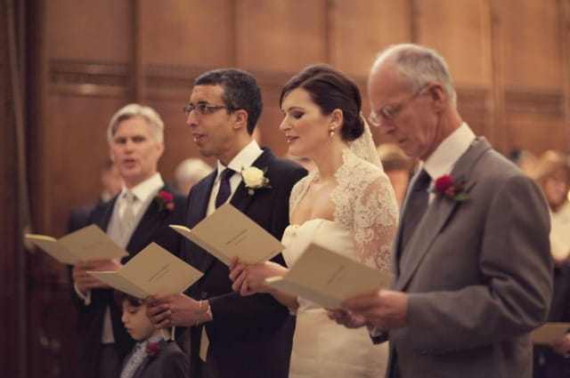 Hymns during wedding service - Picture by Laura McCluskey Photography