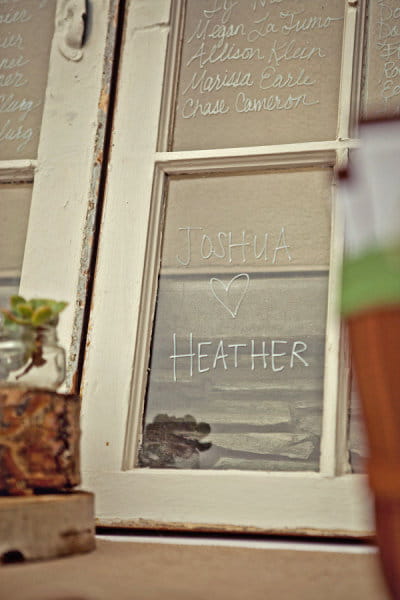 Joshua loves Heather written on glass - Picture by Captured by Aimee