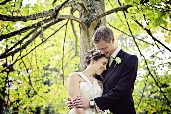 Bride leaning head on groom - Picture by Andrew J R Squires Photography