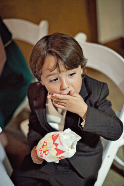 Small boy eating popcorn - Picture by Captured by Aimee