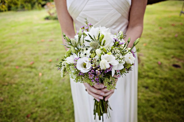 Bride holding bouquet - Picture by Andrew J R Squires Photography