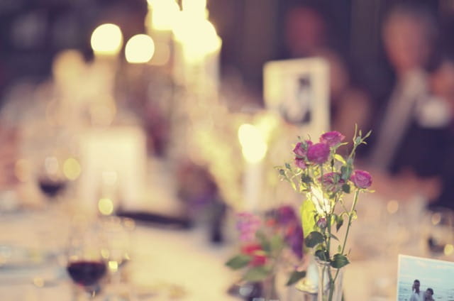 Flowers on a wedding table - Picture by Laura McCluskey Photography