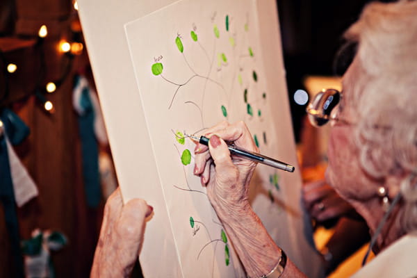 Grandmother writing on family tree - Picture by Andrew J R Squires Photography