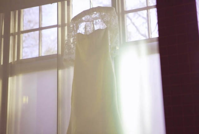 Hanging Vera Wang wedding dress - Picture by Laura McCluskey Photography
