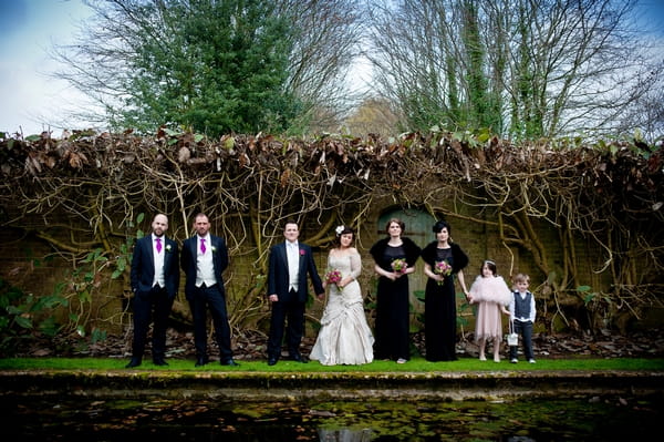 Bridal party standing in front pond - Picture by Lemontree Photography