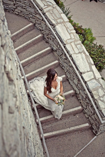 Bride walking down stairs - Picture by Captured by Aimee