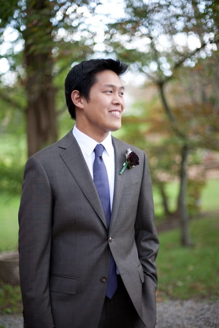 Groom wearing purple tie - Picture by Levi Stolove Photography