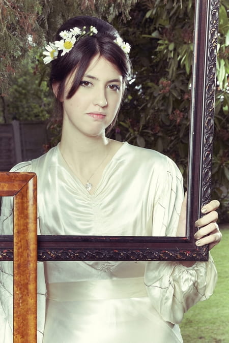 Bride holding picture frame - Picture by Ian Shoots Weddings