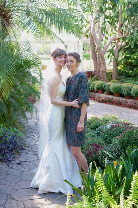 Bride standing with sister - Picture by Rojo Foto Design