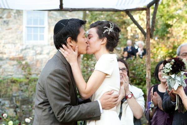 Bride and groom kiss - Picture by Levi Stolove Photography