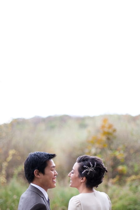 Bride and groom's head with hills in background - Picture by Levi Stolove Photography