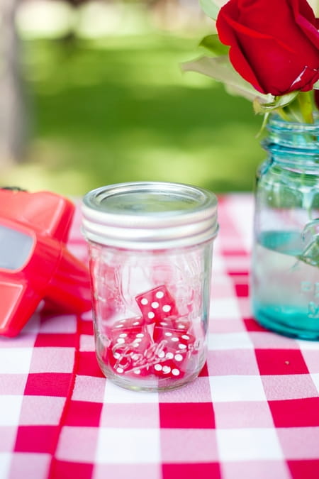 Dice in a jar wedding decoration - Picture by Laura Ivanova Photography