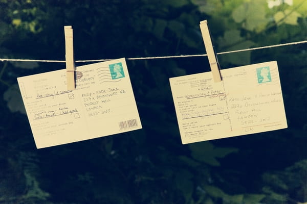 Postcards pegged to clothes line - Picture by Ian Shoots Weddings