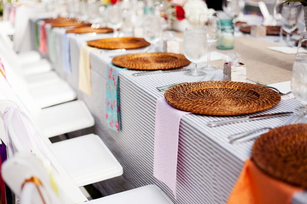 Wedding breakfast table with wicker table chargers - Picture by Laura Ivanova Photography