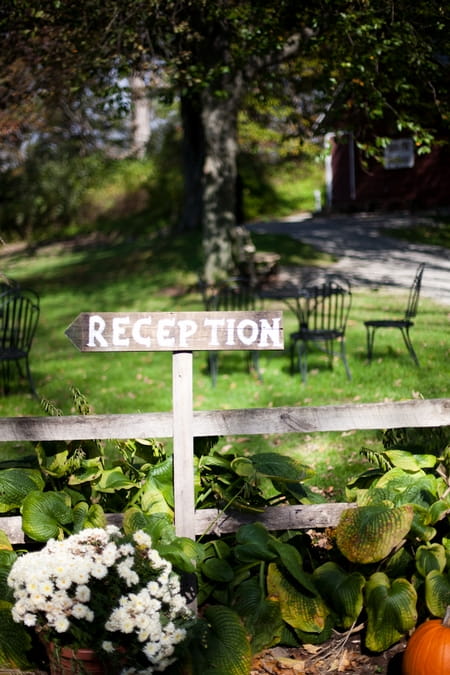 Wooden 'Reception' sign - Picture by Levi Stolove Photography