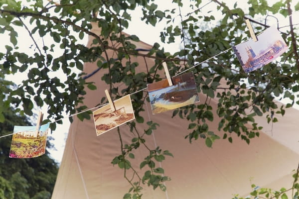 Postcards hanging on clothes line - Picture by Ian Shoots Weddings