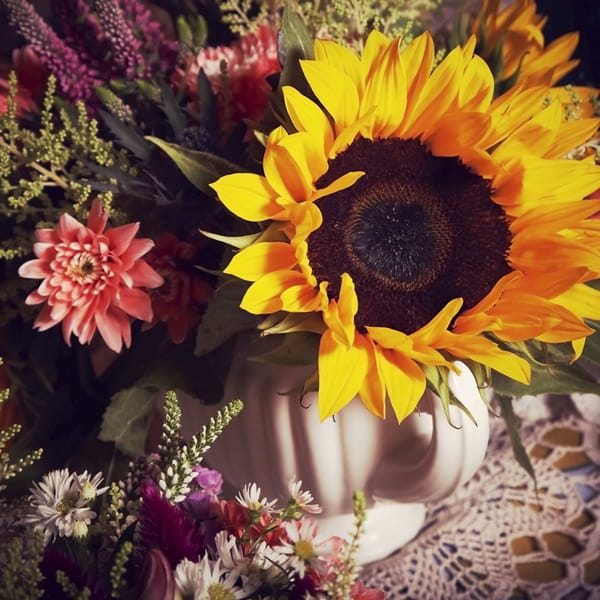 Sunflower wedding flower display - Picture by Ian Shoots Weddings