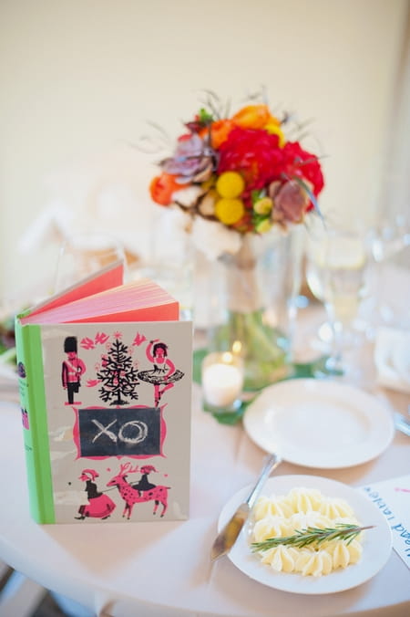 Book on wedding breakfast table - Picture by Rojo Foto Design